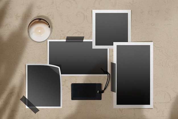 Arrangement of polaroid photos candle and tags