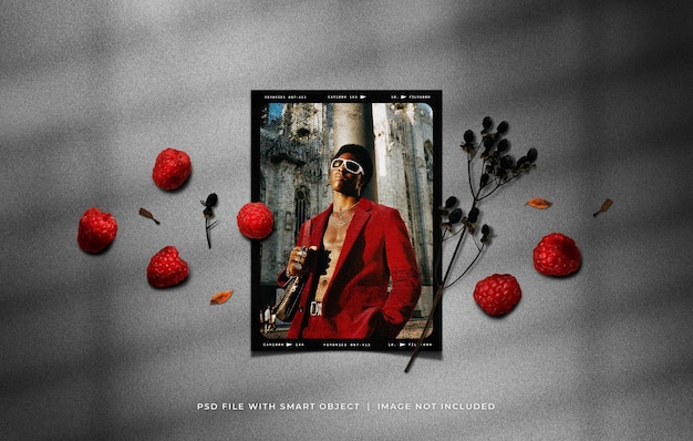 Portrait photo frame mockup with raspberry and dried plant ornaments