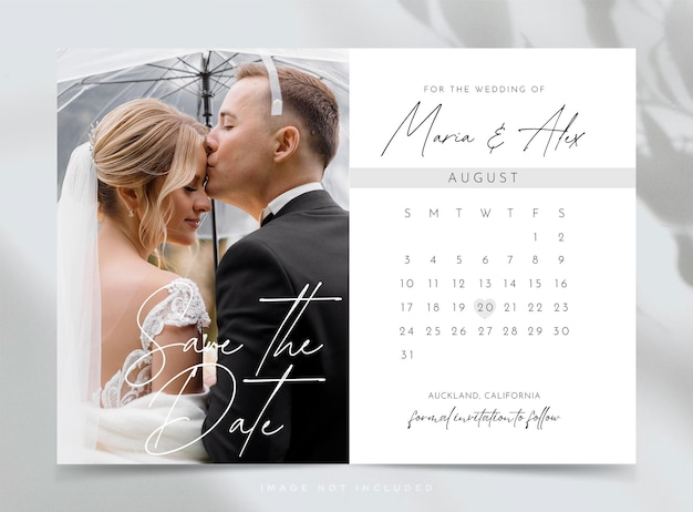 A wedding invitation with a couple kissing under an umbrella